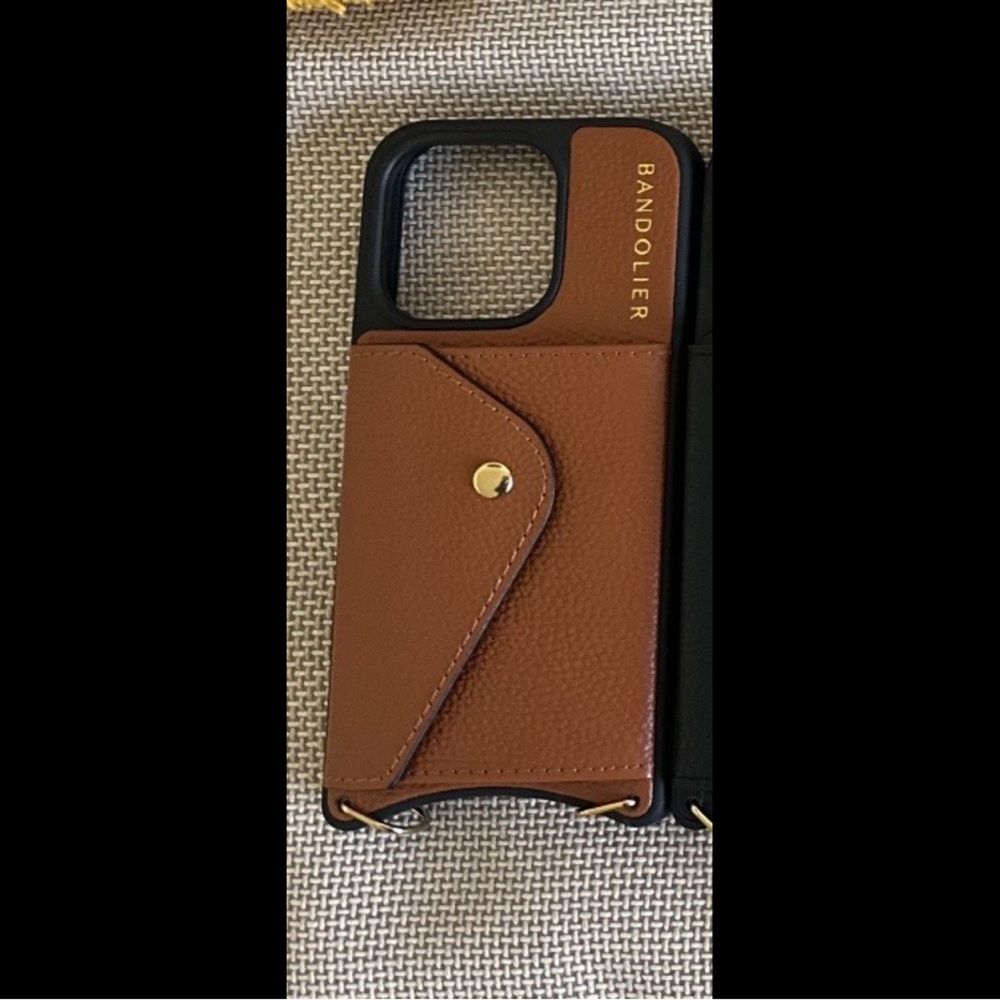 NWT Bandolier IPhone 15 Pro case with strap
